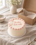 Bride's Last Ride Bento: a 4 inch bento cake in smooth white buttercream with a blush pink shell border round the top edge and a tiny piped white bridal veil with a pink bow at one side of the top