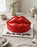 Kiss Kiss Lips Cake: a cake carved into big glossy red lips, covered in smooth red buttercream with a slight shine and a soft piped highlight on the bottom lip