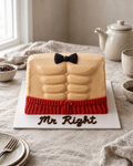 Six Pack Cake: a rectangular sheet cake carved and covered in smooth tanned buttercream to look like a man's toned stomach, front view, with a clear six-pack, a black bow tie piped at the top edge and a waistband of red boxer shorts piped along the bottom edge