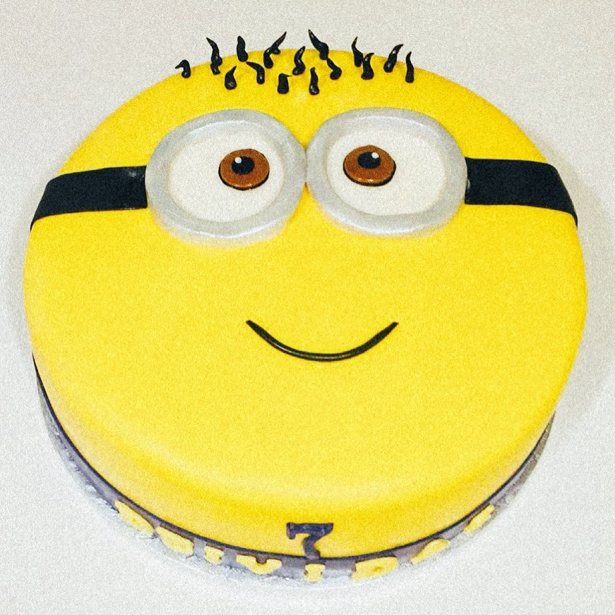 Yellow Character Face Cake by La Sura Bakery