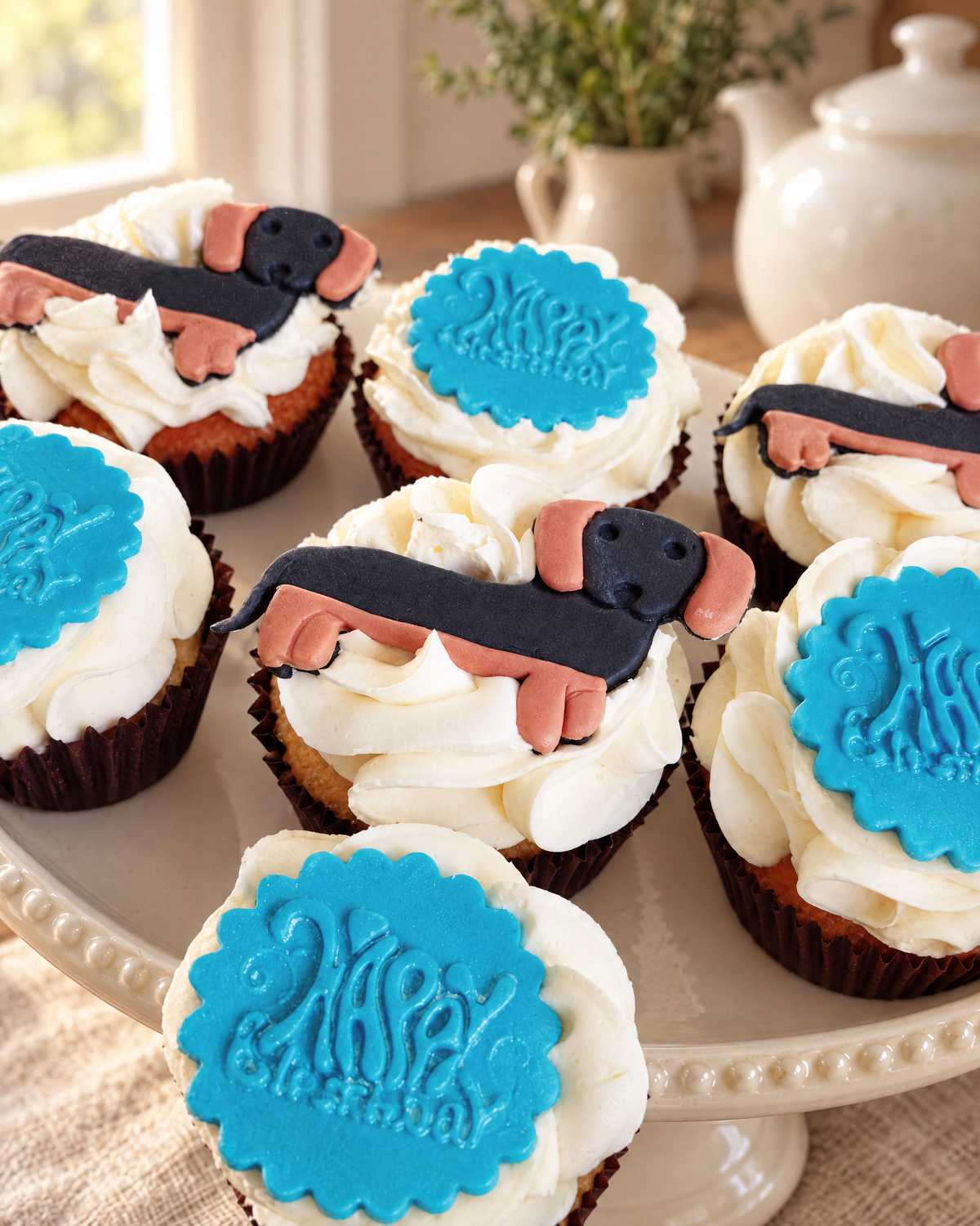 12 Dachshund Cupcake Toppers on a cream cake stand