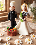 Wedding Couple Cake Topper laid out on a wooden board