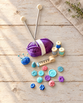 Knitting and Sewing Basket Cake Topper laid flat on a wooden board