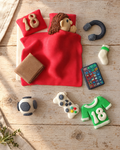 Boy Teenager Bedroom Cake Topper Set laid flat on a wooden board