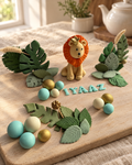 Jungle Lion Personalised Cake Topper laid out on a wooden board