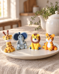 Zoo Animals Cake Topper Set on a cream plate
