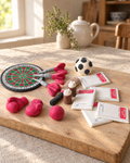 Sports and Pub Cake Topper Set laid out on a wooden board