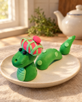 Loch Ness Monster Cake Topper on a cream plate