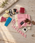 Girl in Bed Personalised Cake Topper laid flat on a wooden board